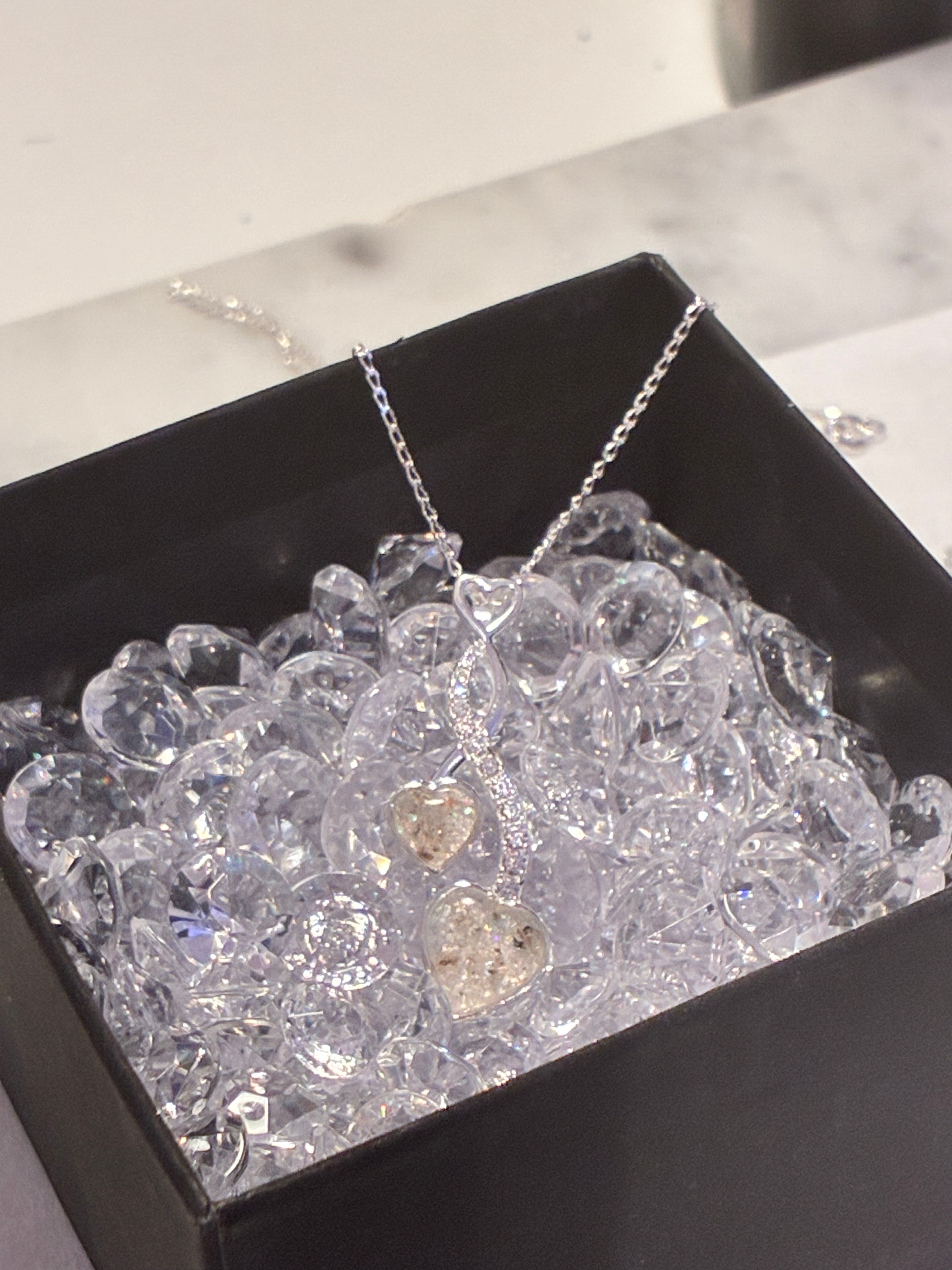 Silver Entwined Hearts With CZ Stones